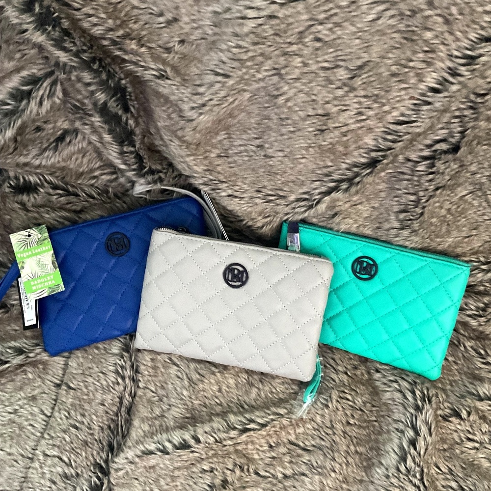 Three different color wallets/purses